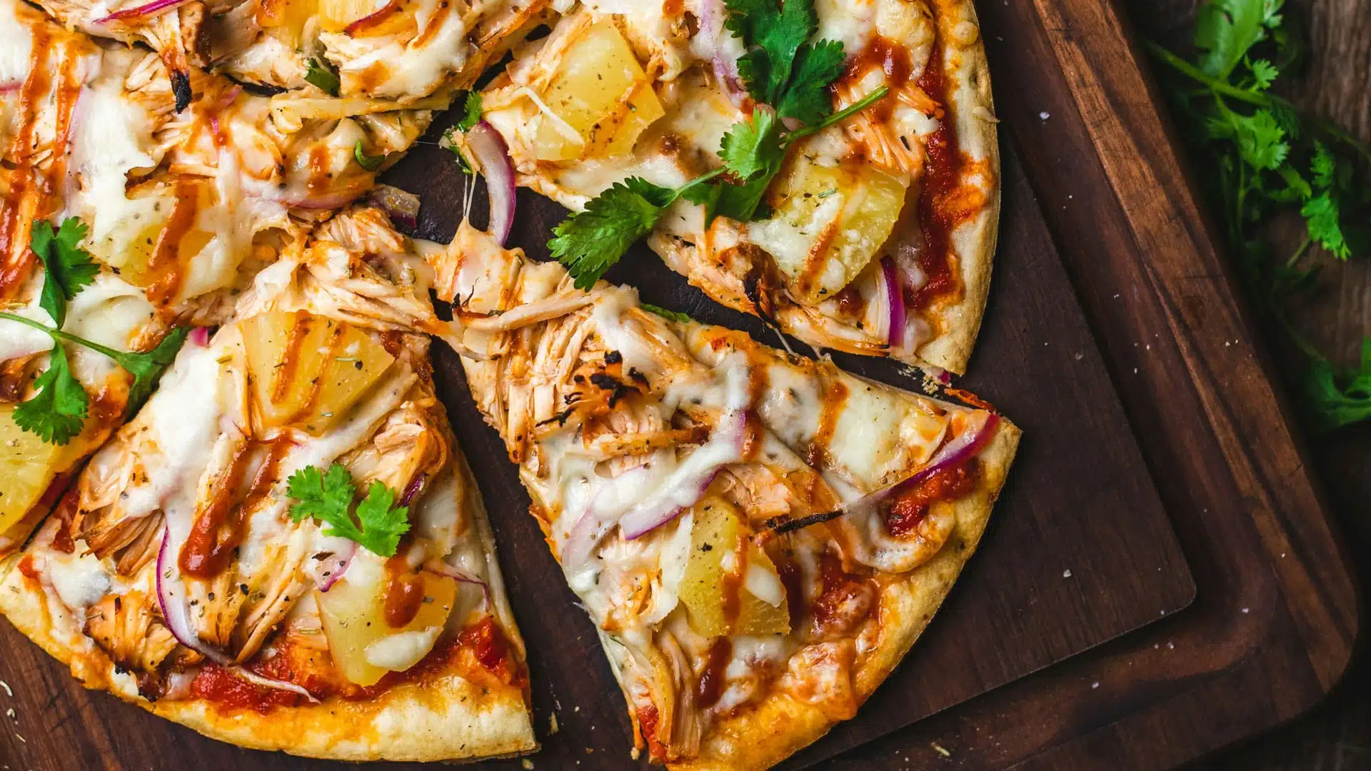 Sliced chicken barbecue pizza.